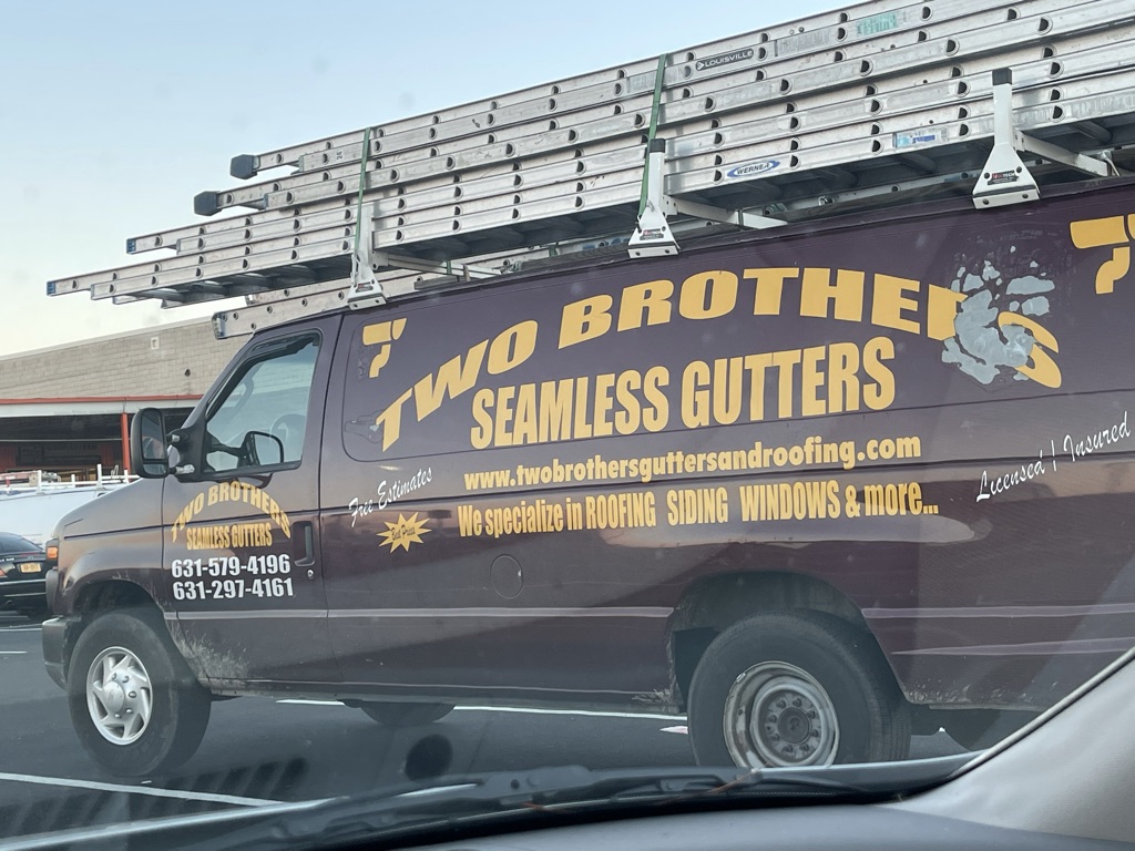Two Brothers Seamless And Gutters logo