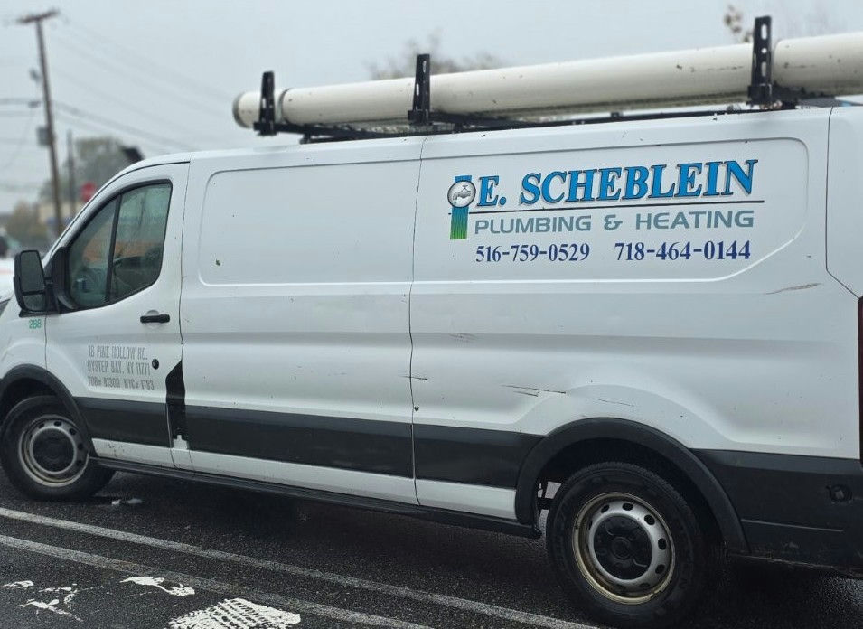 E. Scheblein Plumbing & Heating logo