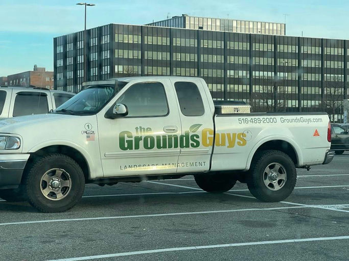 The Grounds Guys logo