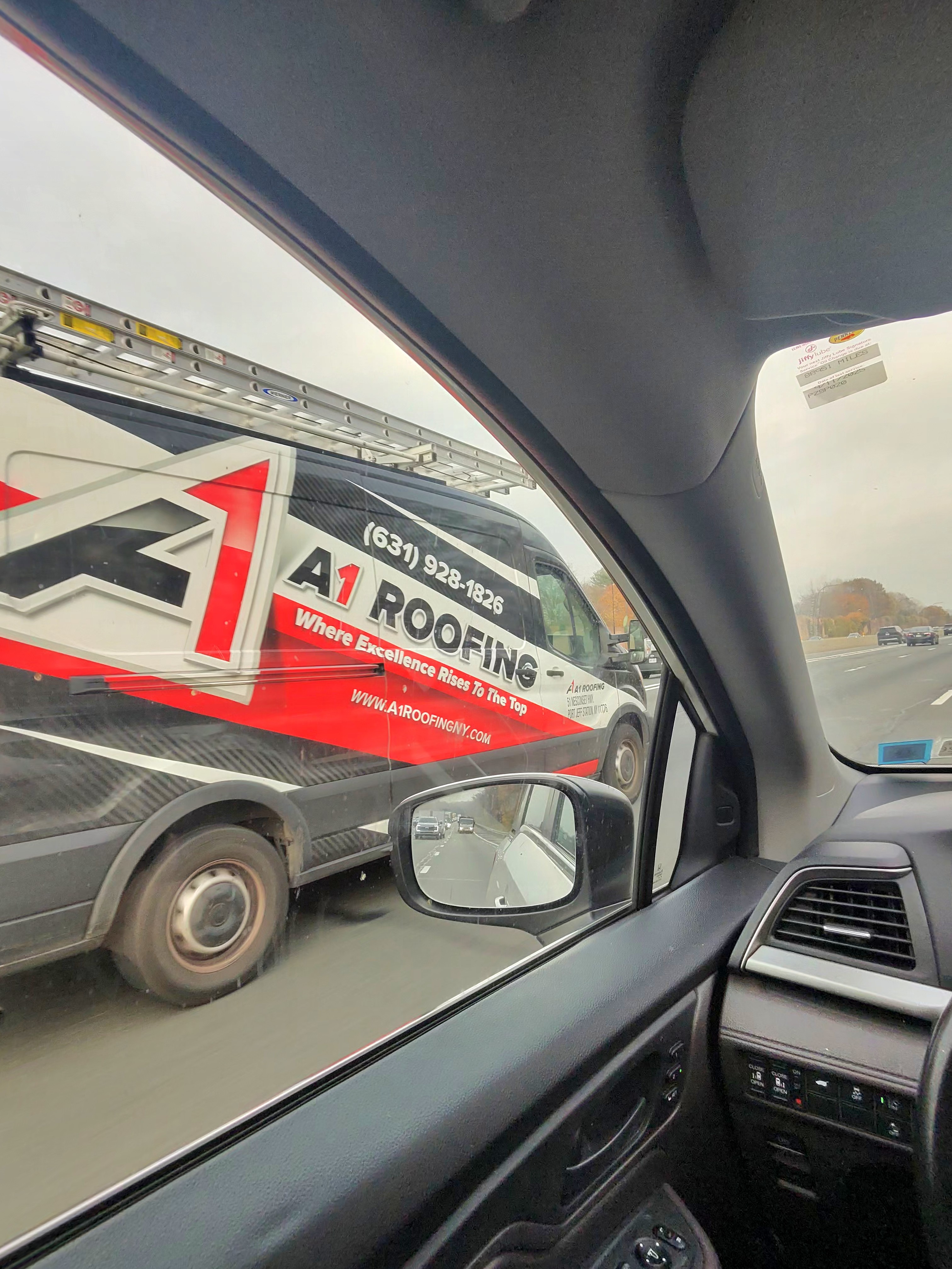 A1 Roofing logo